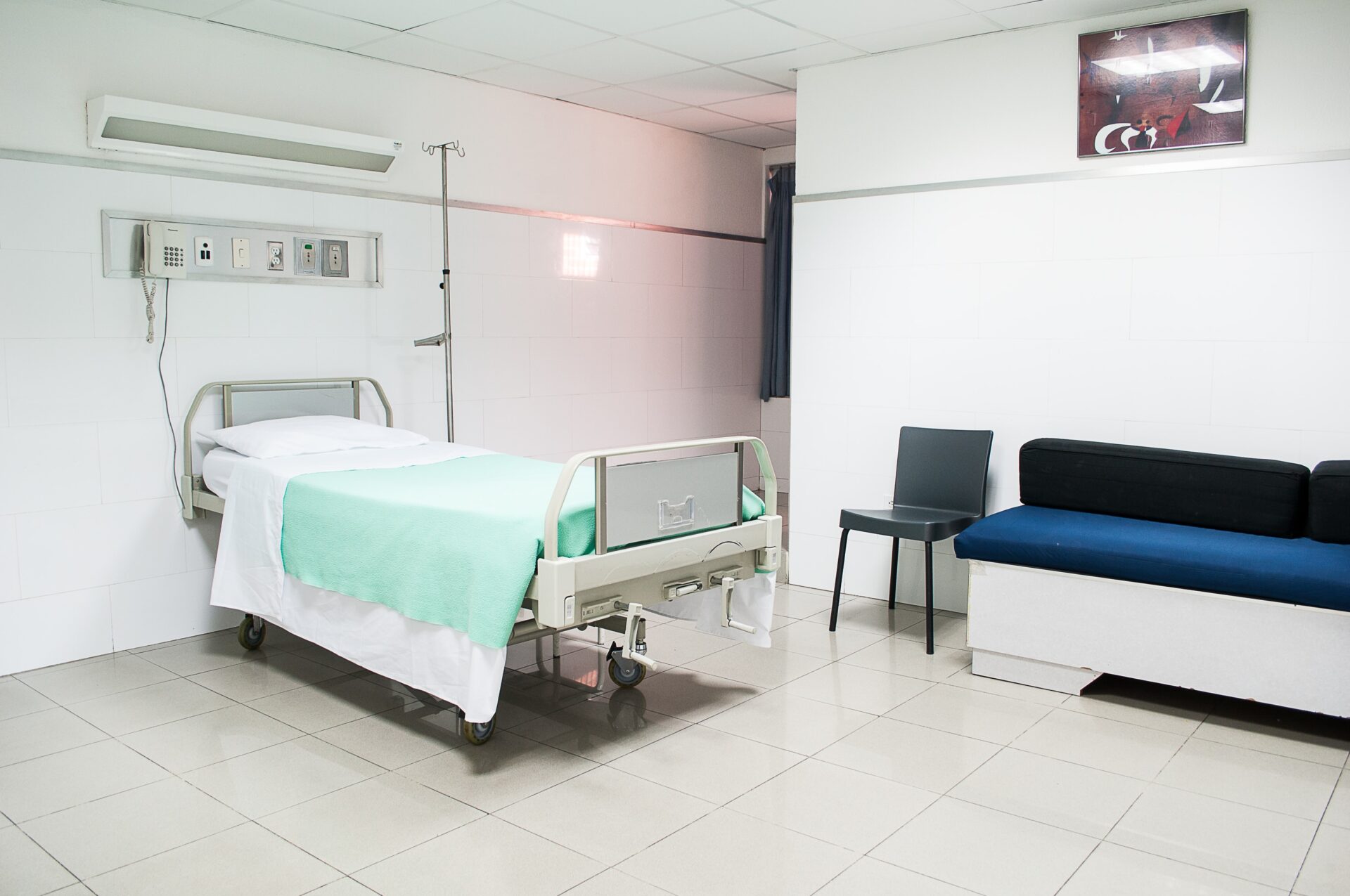 Hospital Room with bed in center